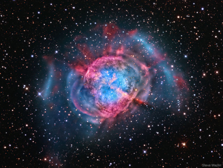 Image of a nebula with red and blue colours.