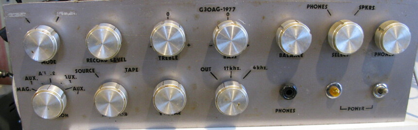 The front panel of my dad's amplifier;  headed 'G3OAG - 1977' - there are spun aluminium knobs, a headphone jack, a power light and a power switch.  There's warn letraset labelling.  It needs a clean.