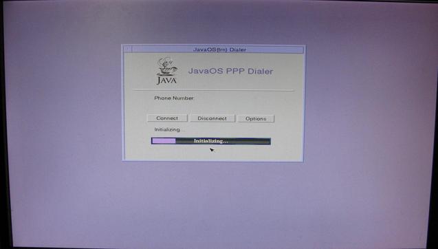 A screenshot of the 'JavaOS PPP dialer' - it's got a Motif style widgetry, a Sun purpley theme, a Java logo in the corner and some options and progress bar.