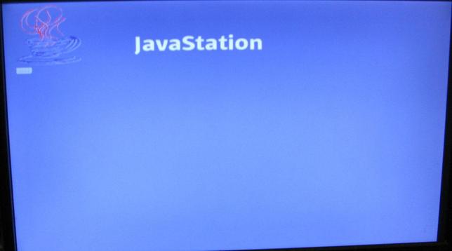 A screenshot, showing a Java logo in the corner, 'JavaStation' in big at the top and an icon that looks like a SIMM, probably indicating ROM boot.