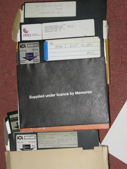 A pile of 8" floppies, some have ICL labels, some have PERQ systems labels, and include a Perq boot floppy, Perq installation tests,  GKS and UKC tools for Perq.