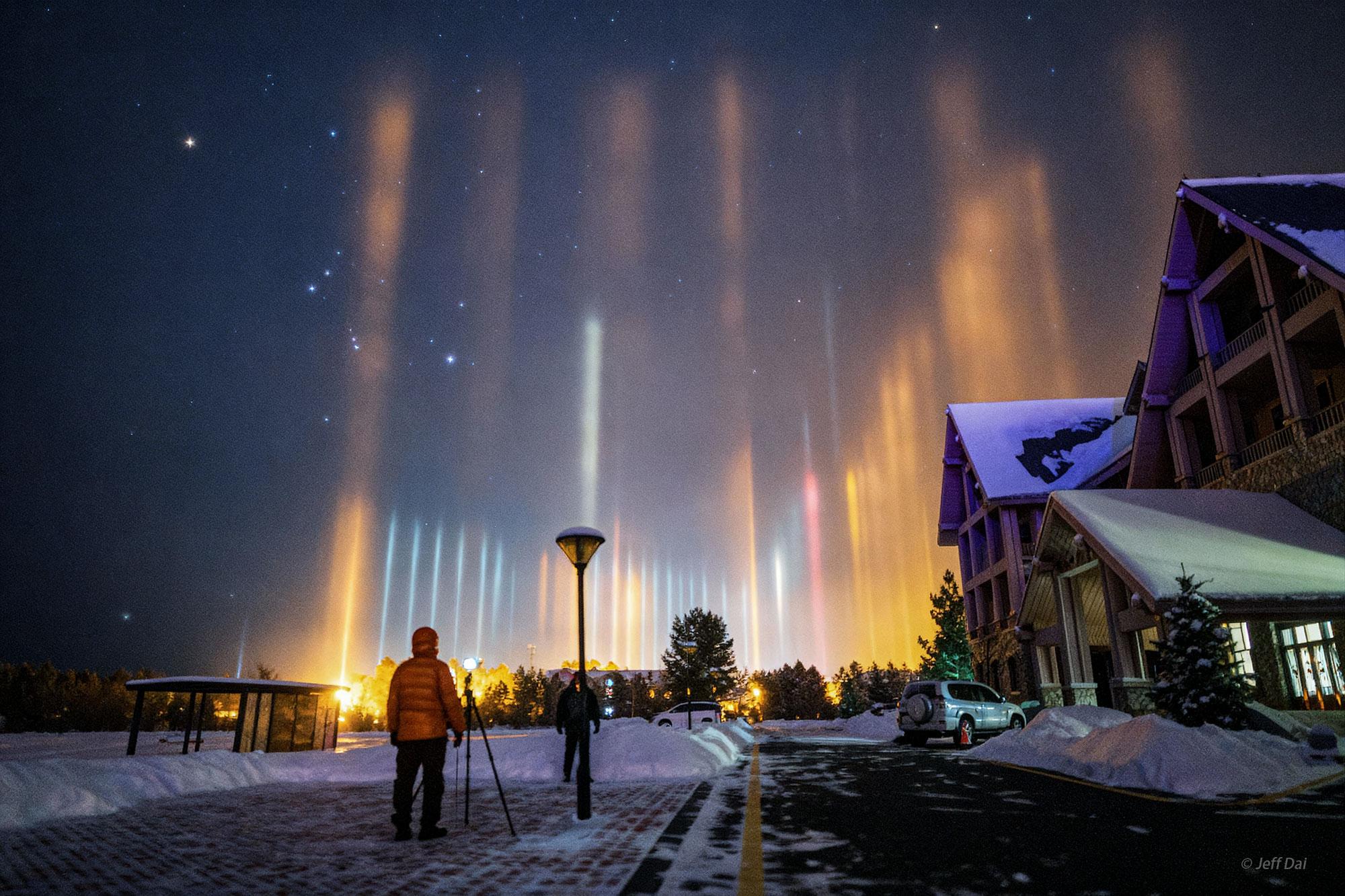 Light pillars seen at night.