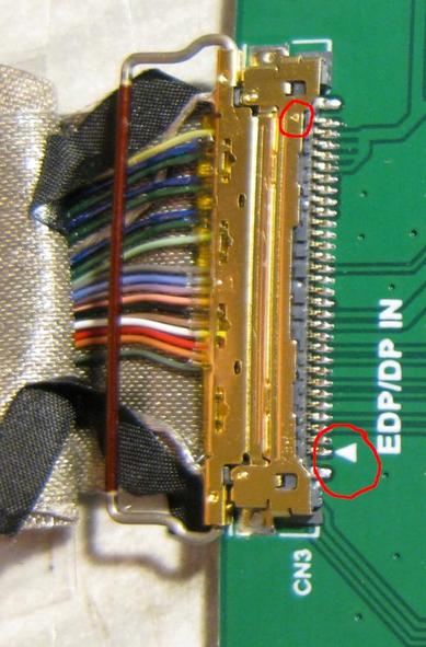 A 30 pin eDP connector paid, which has a triangle mark at the top of the socket, and a triangle mark on the board at the bottom; the interesting pins are close to the boards triangle on the board and close to the sockets triangle mark at the top.  
