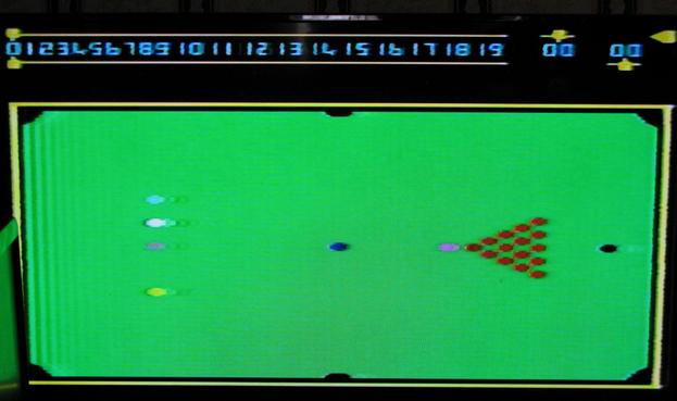 A computer genrated simple snooker table, side on, with all the balls; photo off a TV